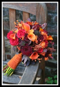 plum hot pink roses and orange calla lilies